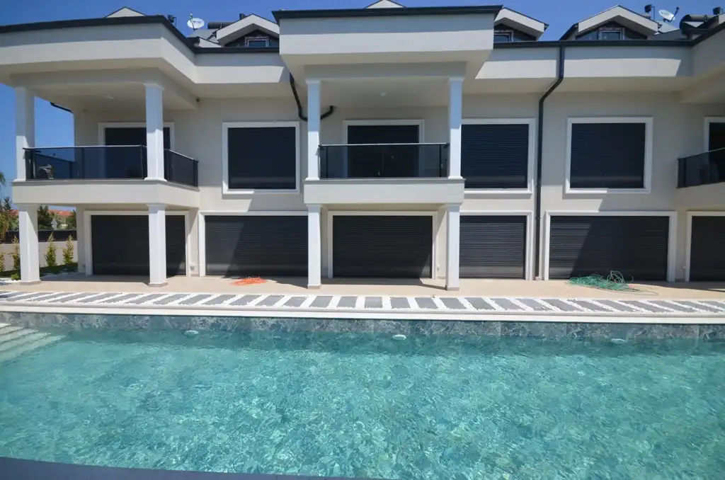 Изображение Новая квартира 4+1 в уникальном комплексе в Фетхие в 10 минутах от пляжа